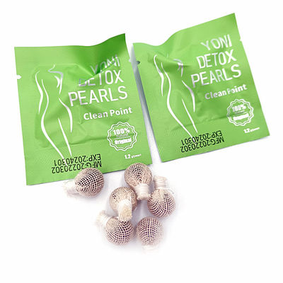 Yoni Detox Perlen in die Vagina mit Einweg-Tampon helfen